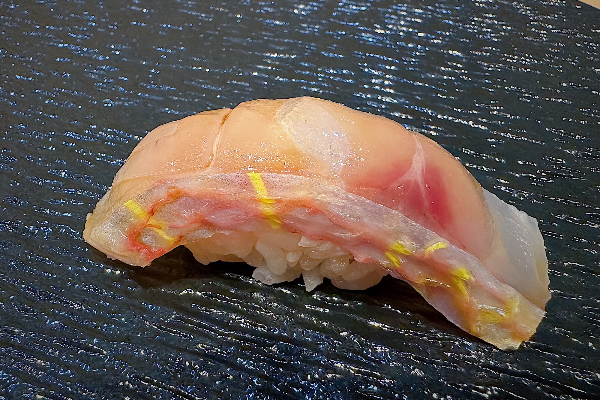 Nigiri on a slate plate